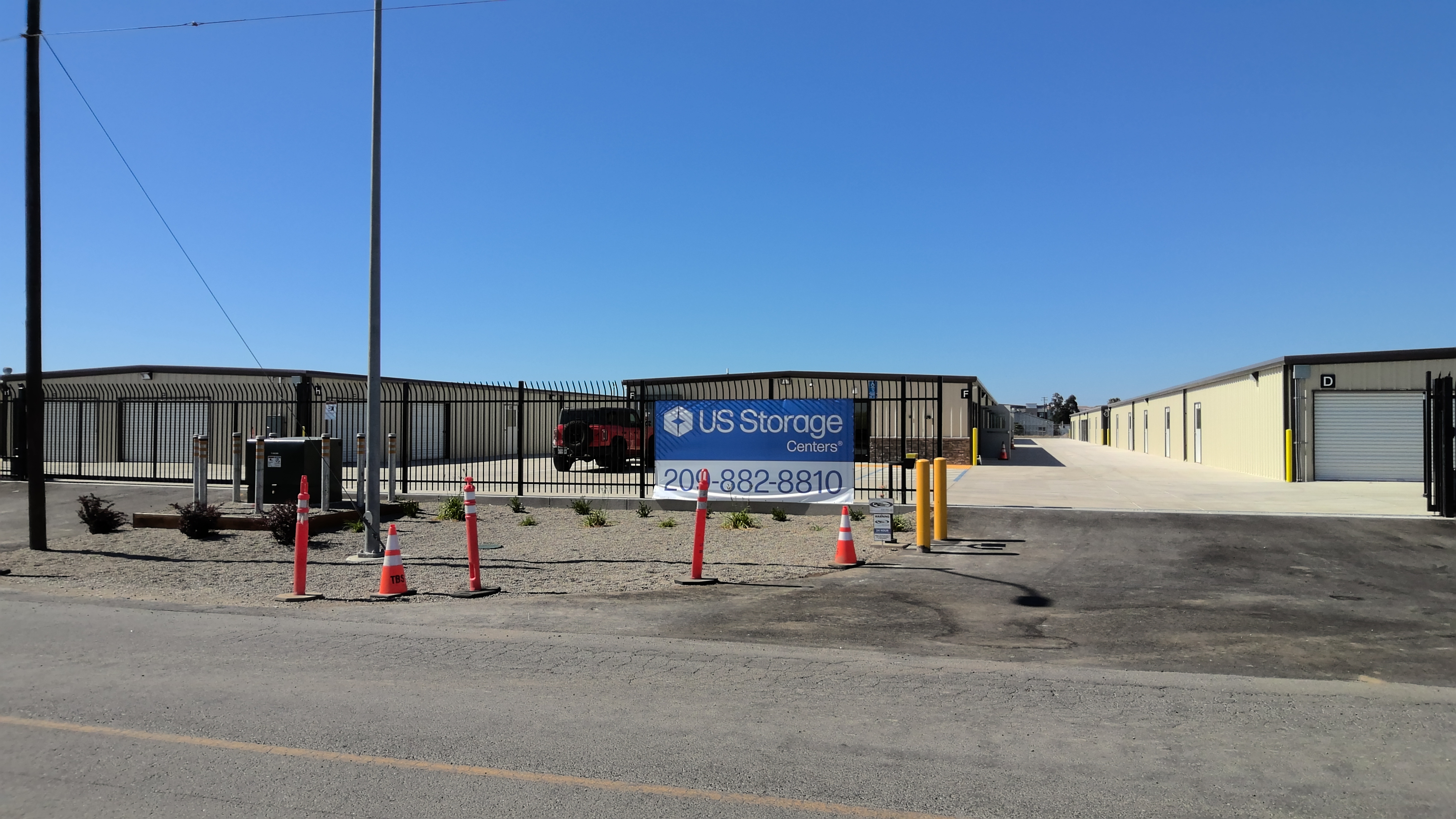 self storage gated access facility exterior entrance 